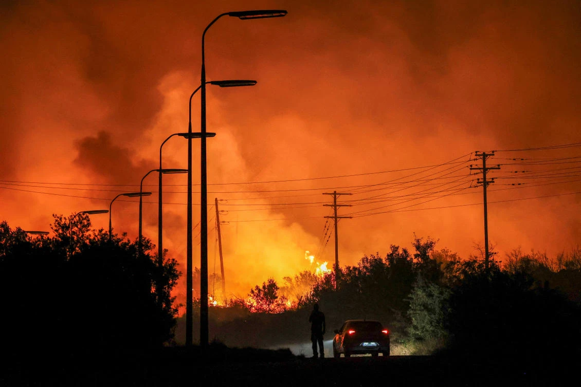 Hundreds of firefighters backed by European Union reinforcements were struggling to contain the flames. (REUTERS)