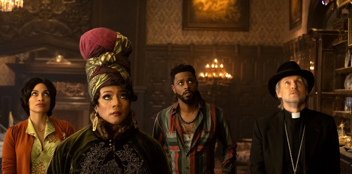 Rosario Dawson, Tiffany Haddish, LaKeith Stanfield and Owen Wilson in ‘Haunted Mansion.’ (Disney Studios)