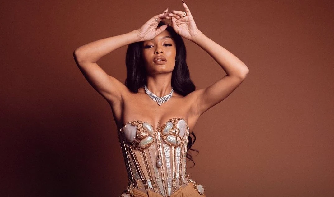The collaboration comes after Shahidi was spotted wearing an exquisite custom-made, bronzed look by Jean Paul Gaultier at the 2023 Met Gala in May. (WWD)