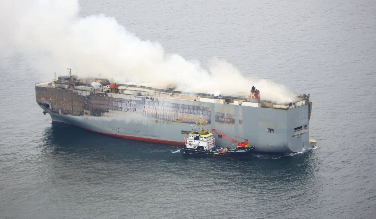 Smoke rises from burning cargo ship Fremantle Highway at sea off the Netherlands. (Reuters)