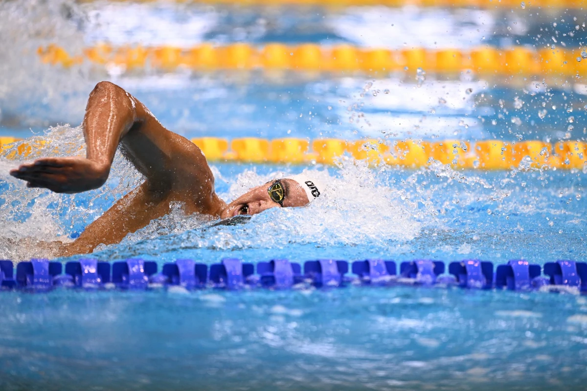 Tunisia's Ahmed Hafnaoui competes in the final of the men's 1500m freestyle swimming event during the World Aquatics Championships in Fukuoka (AFP)