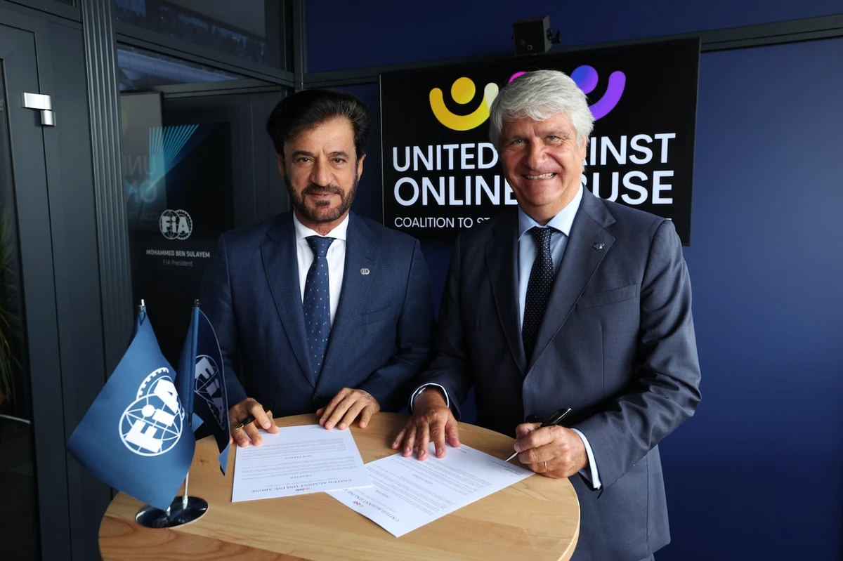 FIA President Mohammed Ben Sulayem and FIM President Jorge Viegas sign a charter to counter online abuse in sport. (Supplied)