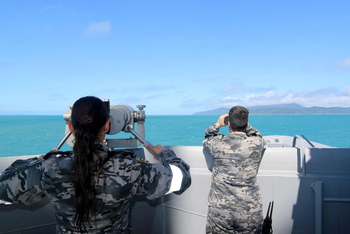 Above, Australian navy sailors conduct search and rescue operations in the vicinity of Lindeman Island, Queensland on July 29, 2023. (Australian Defense/AFP)