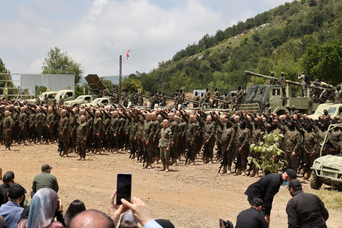 Hezbollah fighters parade in the Lebanese village of Aaramta on May 21, 2023. (AFP/File)