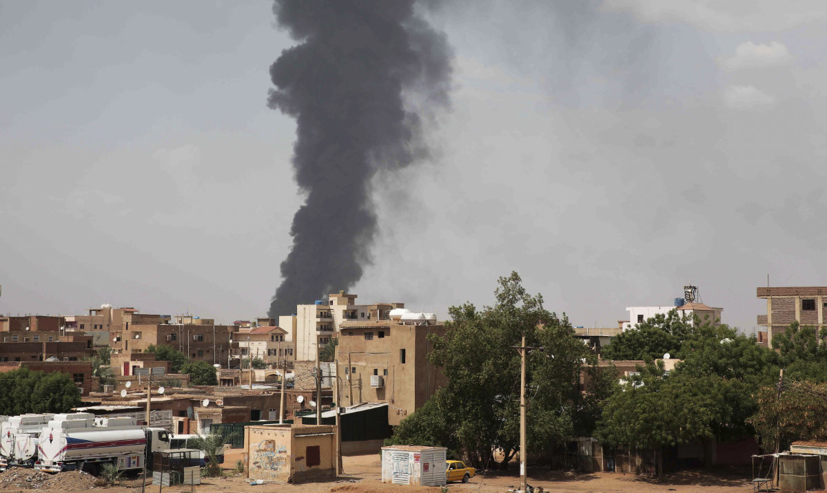 Smoke rises over Khartoum, Sudan, on June 8, 2023, as fighting between the Sudanese army and paramilitary Rapid Support Forces continues. A leading human rights group said on Thursday Aug. 3, 2023 Sudan's warring parties have committed an extensive war crime including mass killings of civilians, rape and sexual slavery of women in the ongoing conflict. (AP)