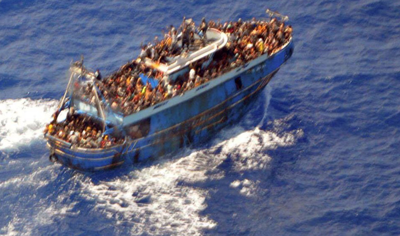 A undated handout photo provided by the Hellenic Coast Guard shows migrants onboard a boat during a rescue operation, before their boat capsized on the open sea, off Greece, June 14, 2023. (Reuters)