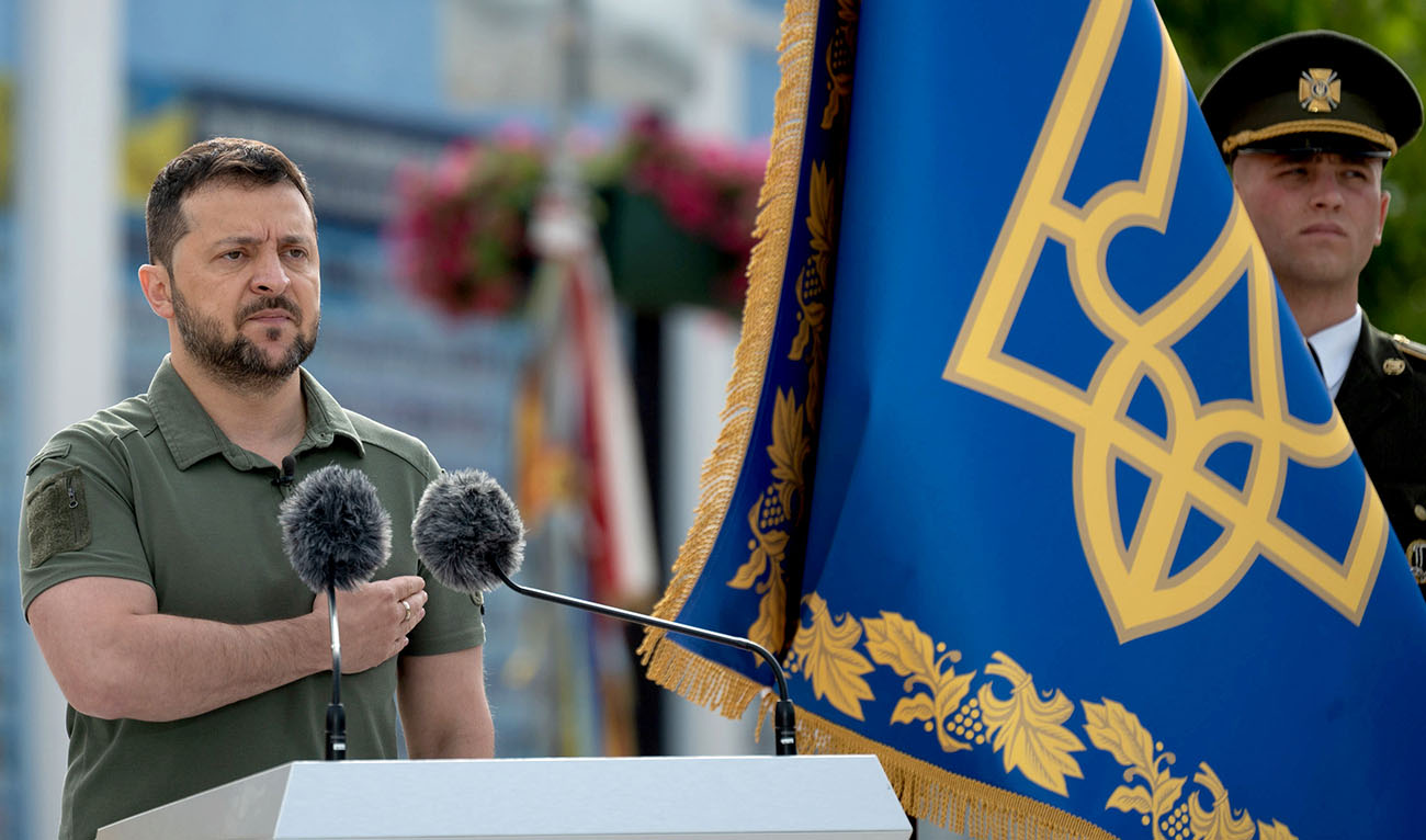 In this handout photograph taken and released by Ukrainian Presidential press-service on July 28, 2023, Ukrainian President Volodymyr Zelensky (L) stands in attention as he takes part in the Day of Ukrainian Statehood ceremony marking the 30th anniversary of Ukrainian independence, amid the Russian invasion of Ukraine. (AFP/File)