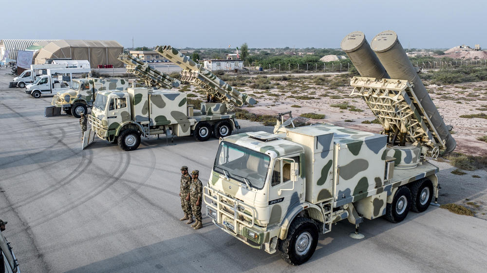 Above, the Iranian Revolutionary Guard display military equipment during an earlier drill on Abu Musa Island in the Arabian Gulf. (Sepahnews via AP)