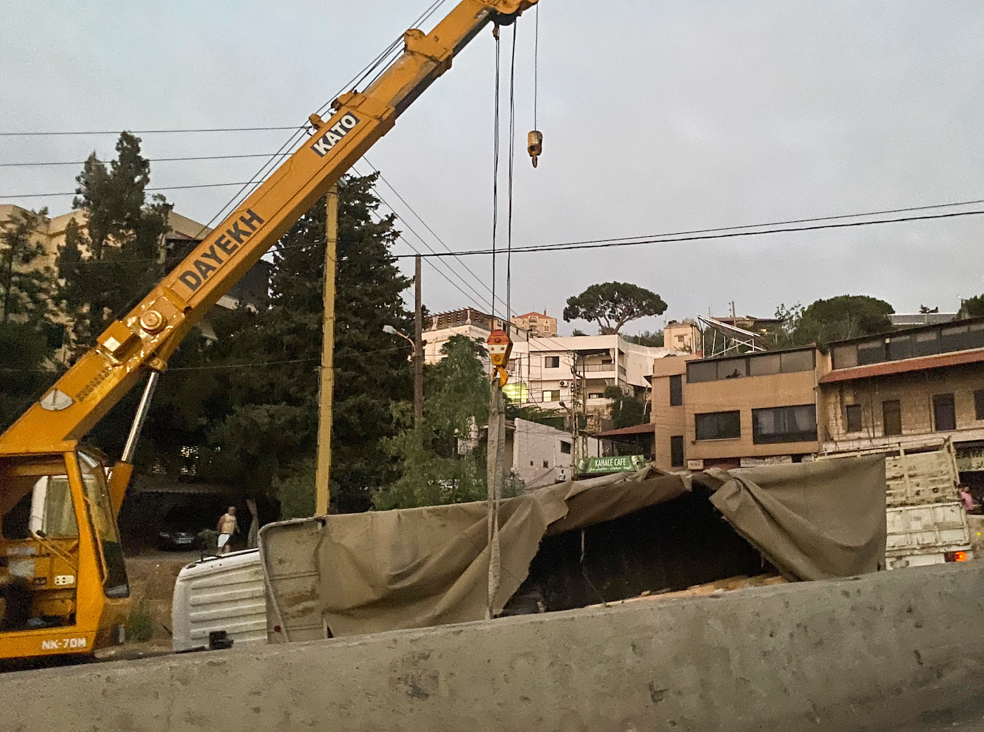 A view shows an overturned lorry in the town of Kahaleh, Lebanon August 9, 2023. (Reuters)
