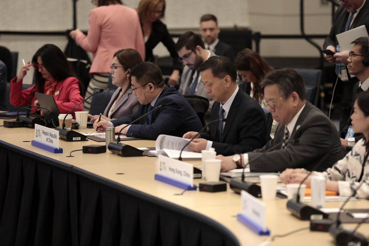 Members of the China delegation attend the APEC Ministers Responsible for Trade meeting in Detroit, Michigan, US, on May 25, 2023. China on Thursday complained that a new US policy restricting investment in Chinese technology disrupts global supply chains. (AFP)