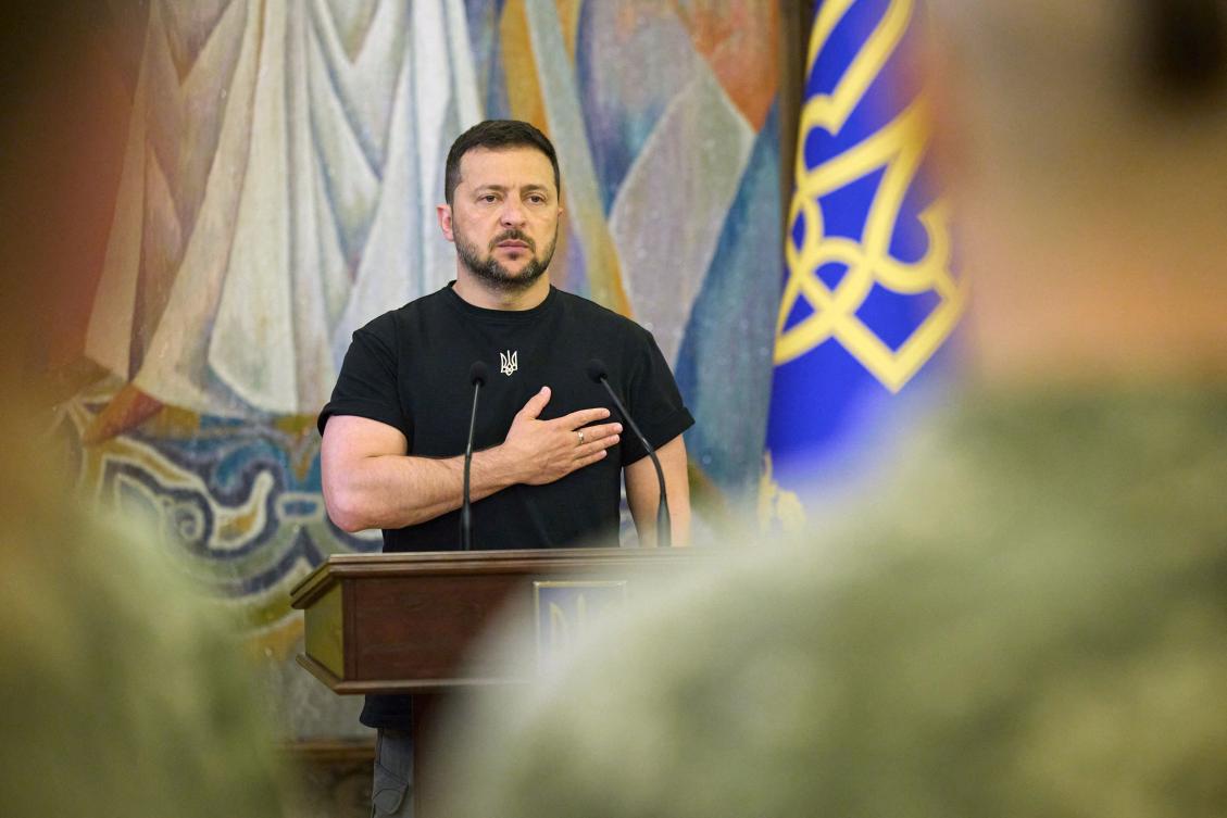 Ukraine President Volodymyr Zelensky listening to the state anthem during ceremony on the occasion of the Day of the Signal Forces of Ukraine. (File/AFP)