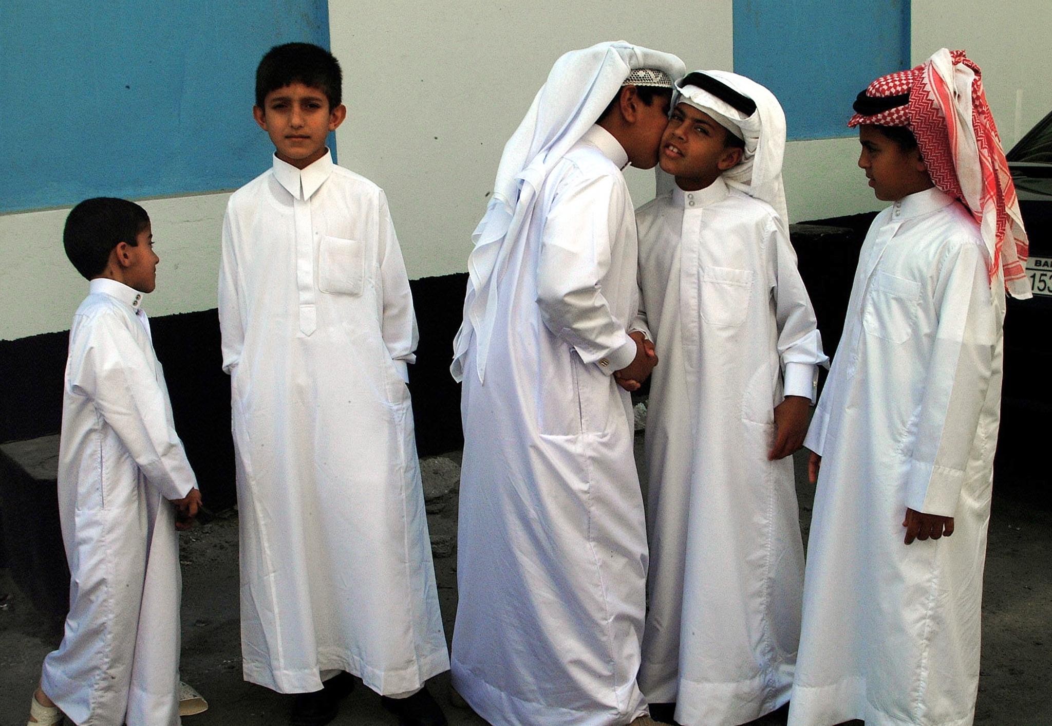 Bahraini kids celebrate the Muslim holiday of Eid al-Adha in Manama. (File/AFP)