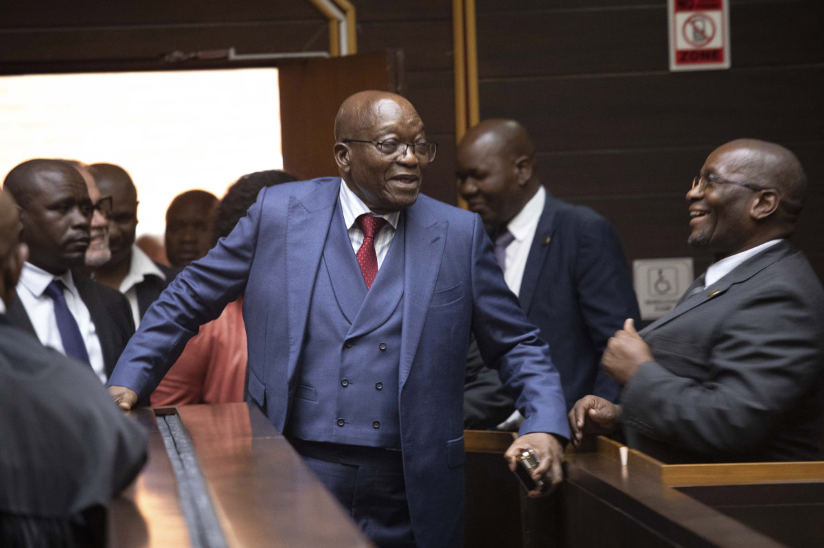 In this photo taken on April 17, 2023, former South African President Jacob Zuma, center, arrives at the Pietermaritzburg High Court in South Africa Zuma, and released to correctional supervision afterward. On August 11, he was taken back to prison and released again within two hours. (Kim Ludbrook/Pool via AP/File)