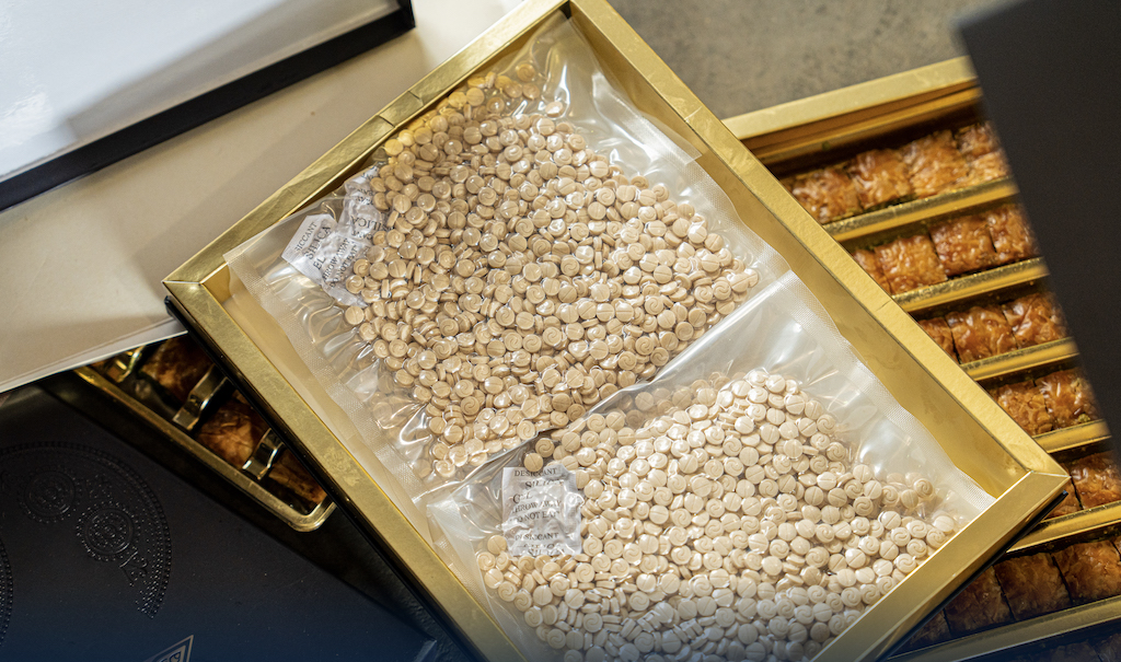 The drugs were discovered hidden under trays of the sweet Baklava pastry. (Zakat, Tax and Customs Authority)
