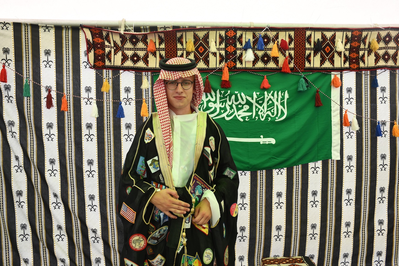 The mishlah scout initiative involved adorning the bisht with an array of scout badges from local, regional, and international events. (Supplied)