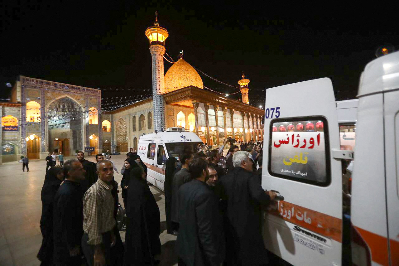Rescuers transport an injured person after an attack in Shah Cheragh Shrine in Shiraz, Iran August 13, 2023. (Reuters)
