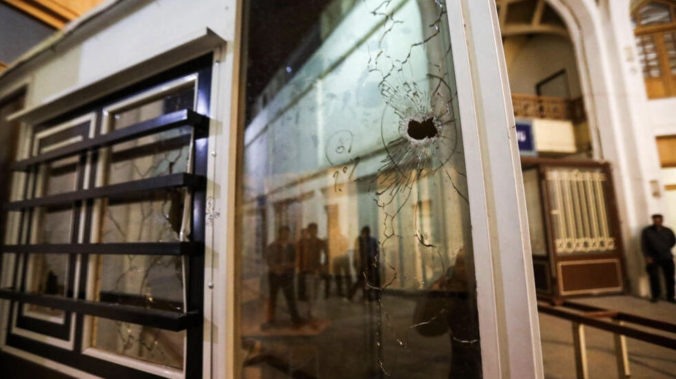 The fatal attack at Iran's Shah Cheragh mausoleum in Shiraz, the capital of Fars province, left windows shattered by bullets. (AFP)