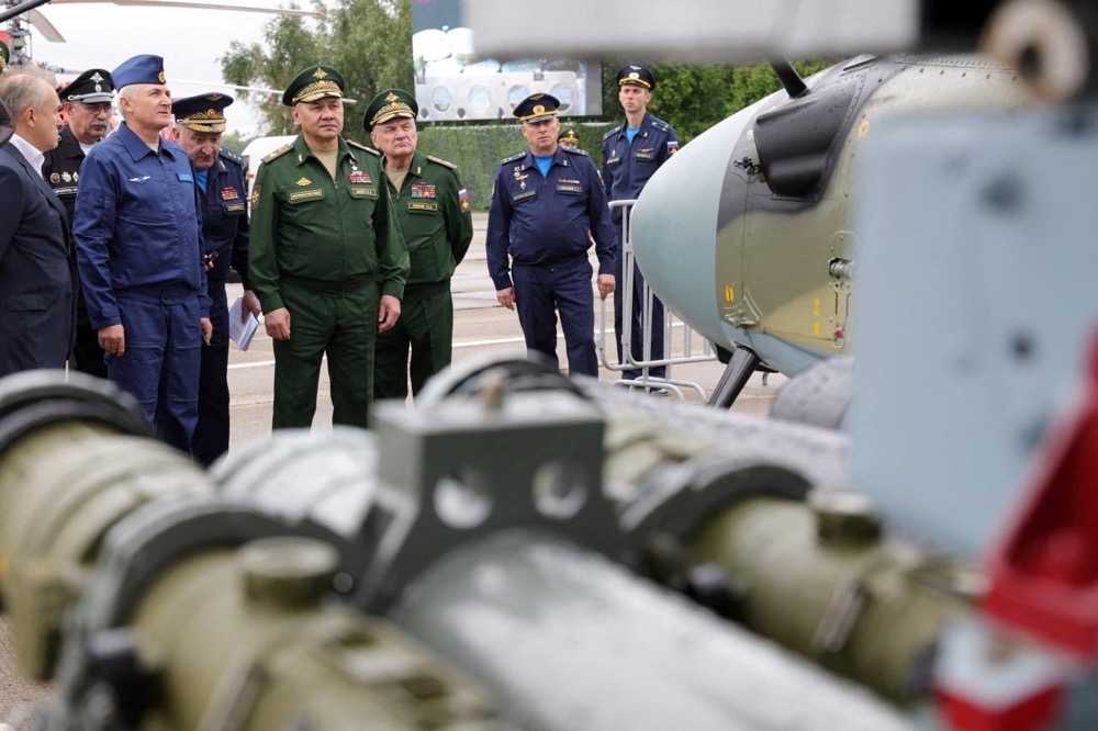 Russia's Defence Minister Sergei Shoigu tours an exhibition at the international military-technical forum Army-2023 at Patriot Congress and Exhibition Centre in the Moscow region, Russia. (Reuters)