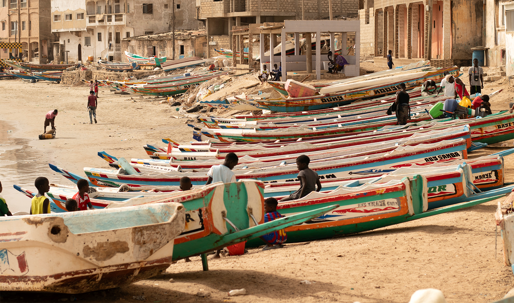 Children play on fishing boats known as "pirogues" in Dakar, Senegal, on June 24, 2023. (Photo courtesy: AP/File)