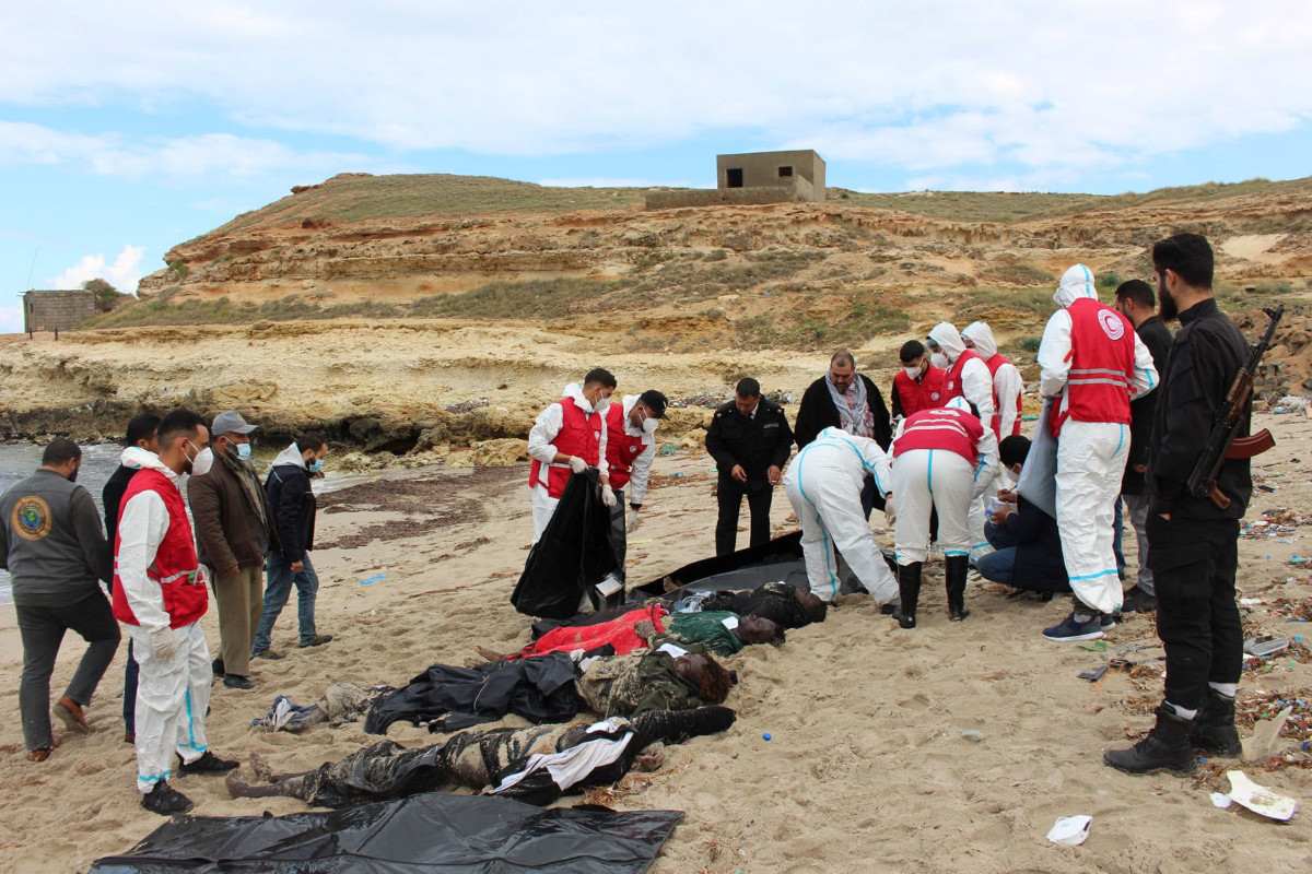 Above, the bodies of some of at the 73 ‘missing and presumed dead’ from a shipwreck on Feb. 14, 2023 are retrieved off the coast of Libya. (Red Crescent/AFP)