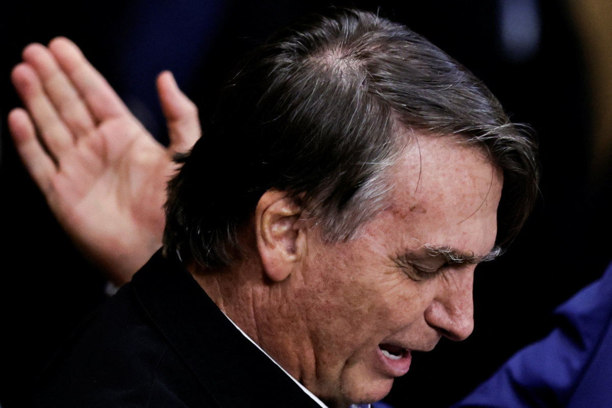 Former Brazilian President Jair Bolsonaro reacts during a session in the Legislative Assembly of Goias to receive the title of citizen of Goias, in Goiania, Brazil August 18, 2023. (REUTERS)