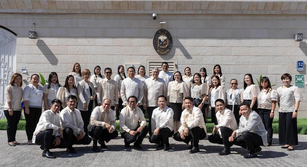 In this undated photo, Philippine Ambassador to the UAE Alfonoso A. Ver, center, second row, poses with Philippine embassy staff in Abu Dhabi. (Philippine Embassy)