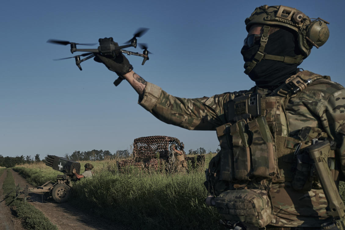 Ukrainian soldier of the 28th brigade launches a drone at the frontline close to Bakhmut, Ukraine. (File/AP)