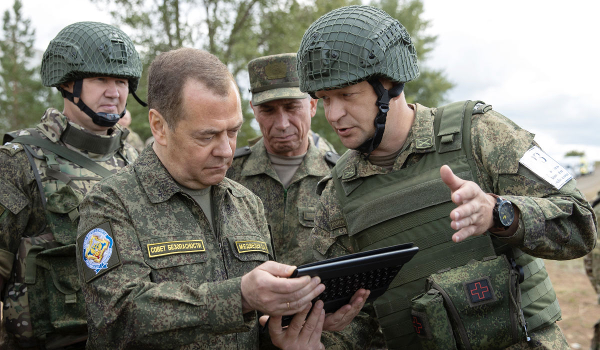 Russia's former president and now serving as deputy chairman of the country's Security Council, Dmitry Medvedev (L), visits the Totsky military training field outside Siberian city of Orenburg on July 14, 2023. (AFP)