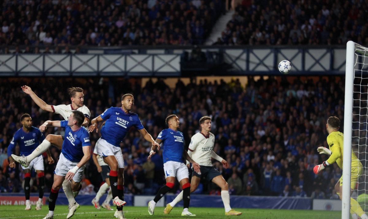 PSV Eindhoven's Luuk de Jong scores their second goal during the Champions League playoff first leg against Glasgow Rangers at Ibrox on Tuesday. (Reuters)
