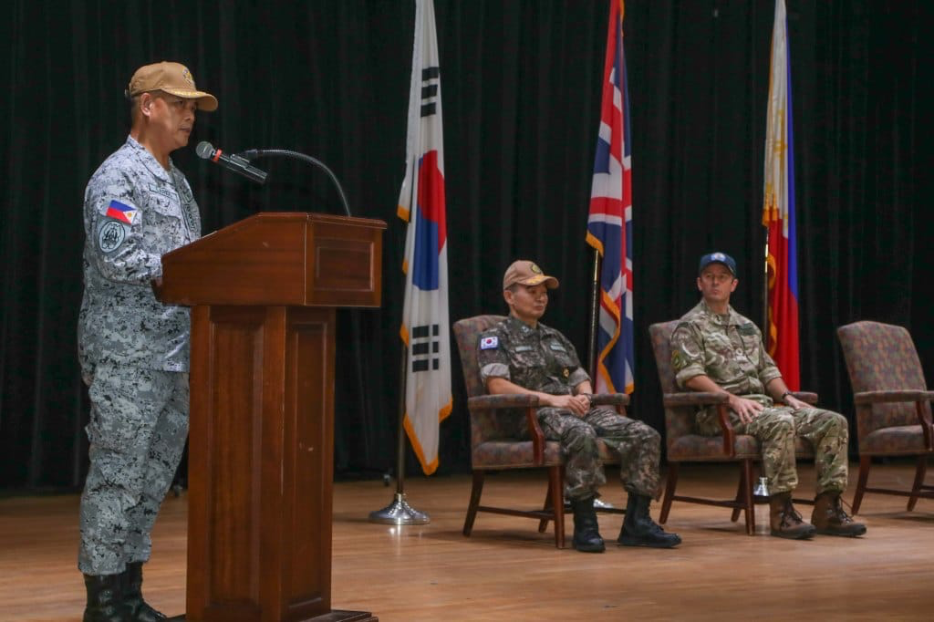 Philippine Navy Capt. Mateo Carido delivers his remarks during the turnover ceremony assuming command of multinational Combined Task Force 151 in Manama, Bahrain. (Supplied)