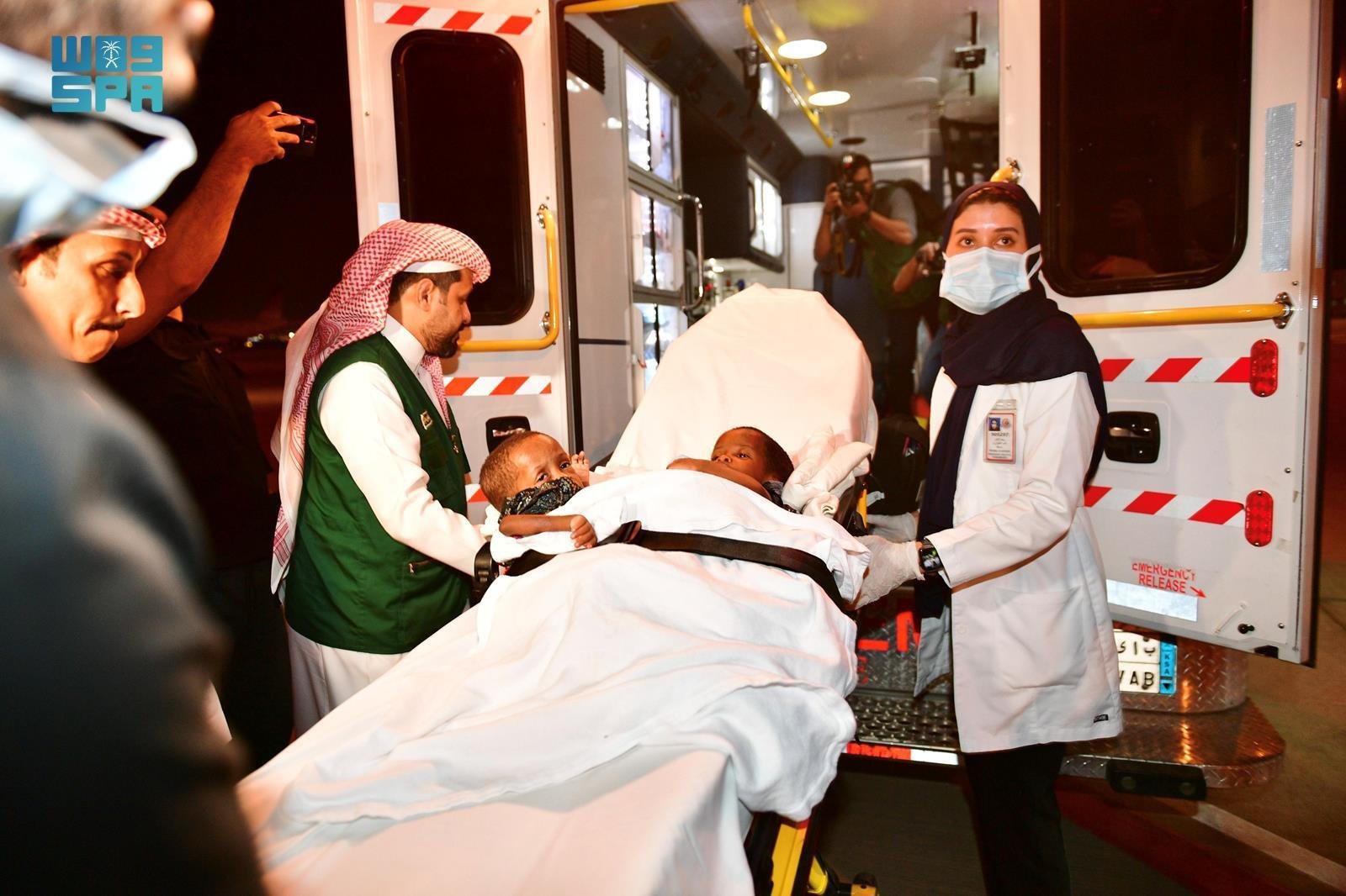 Conjoined Tanzanian twins Hassan and Hussain arrive in the Kingdom. (SPA)
