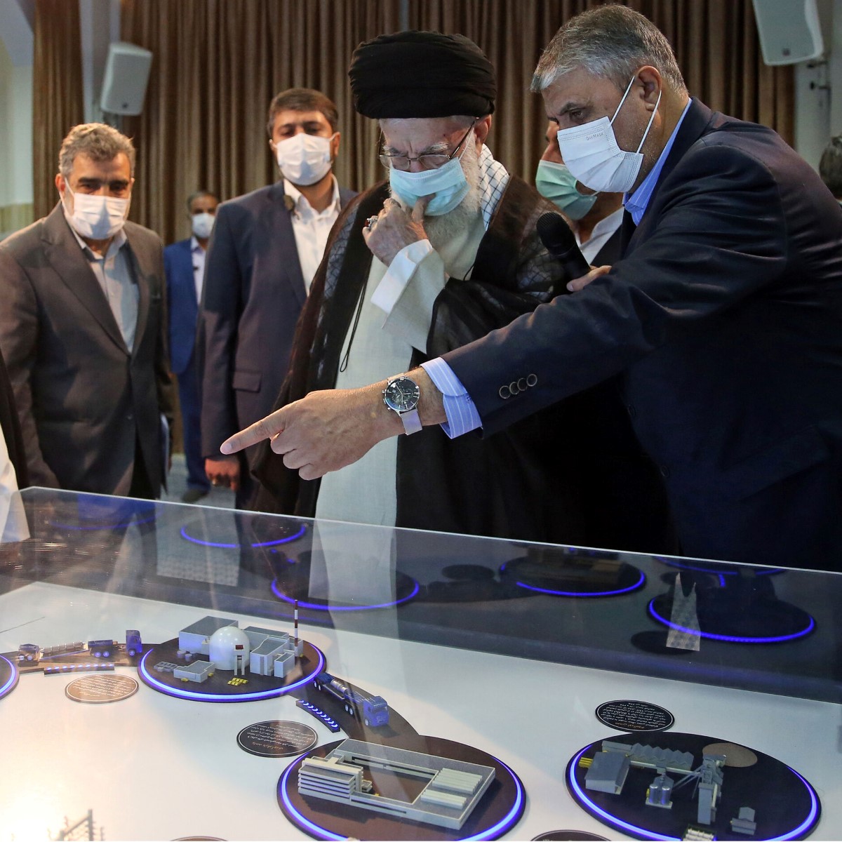 File photo from June 2023 Iran's Supreme Leader Ayatollah Ali Khamenei shows him (2nd R) visiting an exhibition of the country's nuclear industry achievements in Tehran,