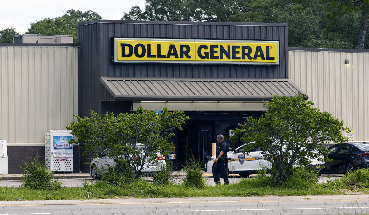 Law enforcement officials continue their investigation at a Dollar General Store that was the scene of a mass shooting, Sunday, Aug. 27, 2023, in Jacksonville, Fla. (AP)