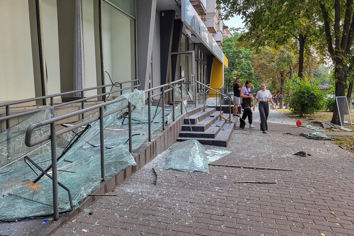 In Kyiv, falling debris killed two people and injured another after Russia launched a “massive combined attack” on the Ukranian capital. (Reuters)