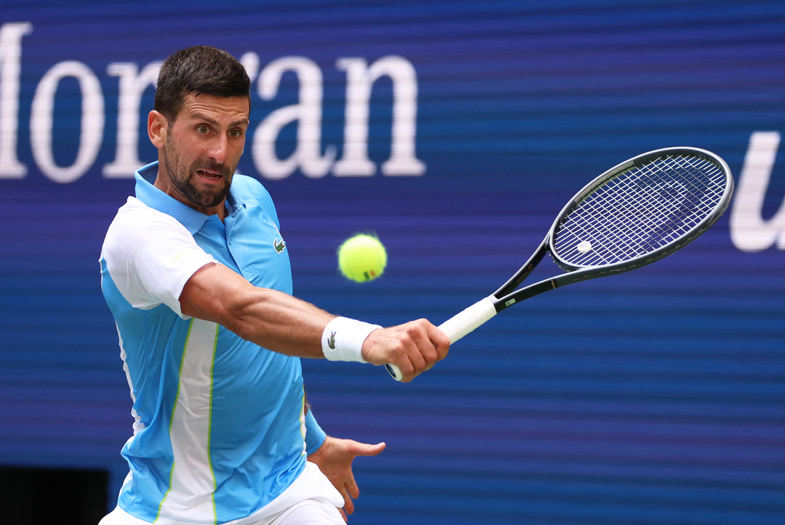 Novak Djokovic of Serbia plays a backhand against Bernabe Zapata Miralles of Spain during their men's singles second round match at the 2023 US Open at the USTA Billie Jean King National Tennis Center. (File/AFP)