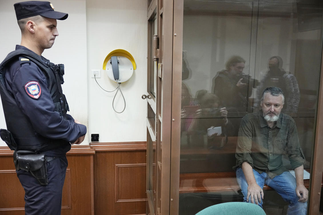 Igor Girkin also known as Igor Strelkov, the former military chief for Russia-backed separatists in eastern Ukraine, sits in a glass cage in a courtroom at the Moscow's City Court in Moscow on Aug. 29, 2023. (AP)