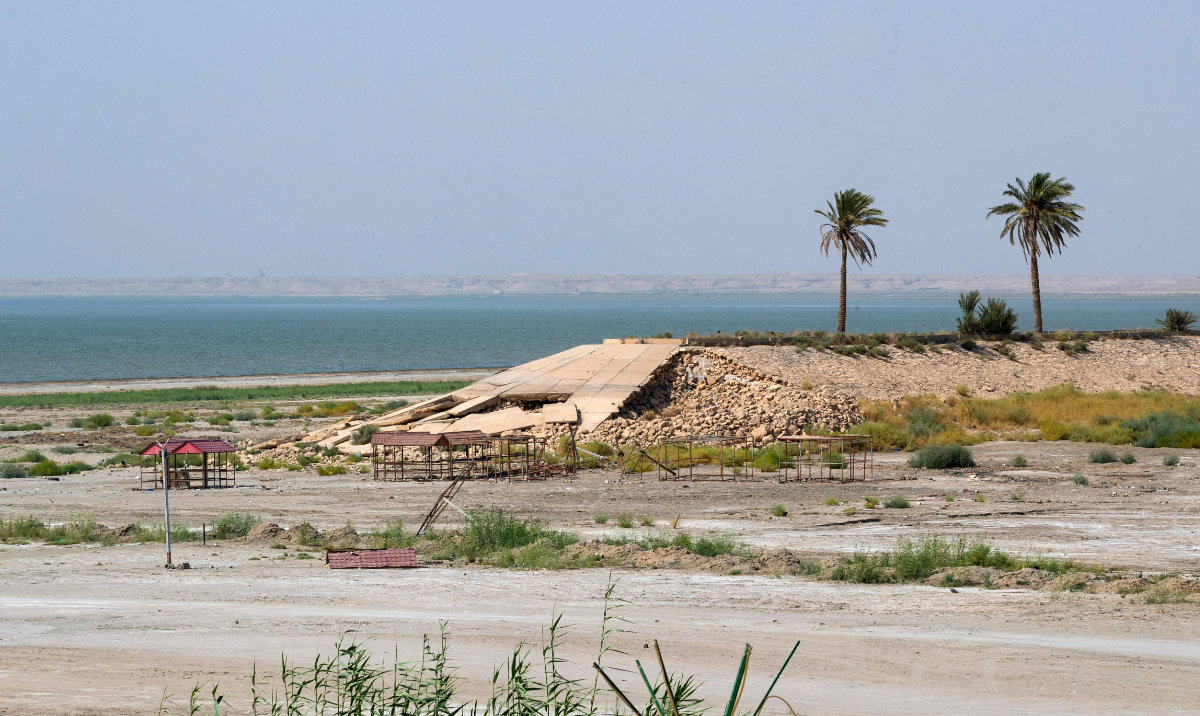 A picture shows dilapidated touristic installations by the Habbaniyah lake affected by severe drought in Iraq. (AFP)