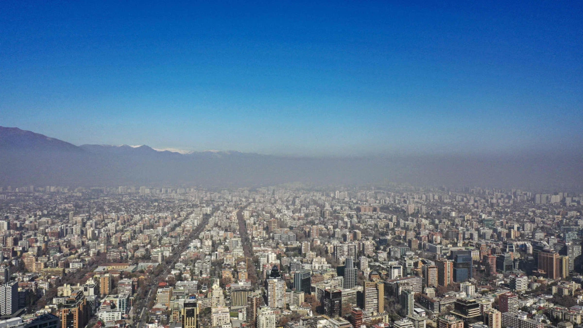 View of La Moneda presidential palace showing the smog caused by high temperatures in Santiago, Chile, taken on August 2, 2023. (AFP)