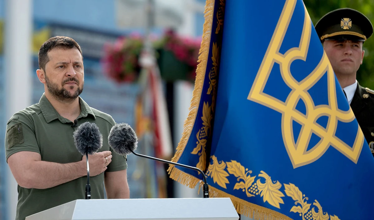 In this handout photograph taken and released by Ukrainian Presidential press-service on July 28, 2023, Ukrainian President Volodymyr Zelensky (L) stands in attention as he takes part in the Day of Ukrainian Statehood ceremony marking the 30th anniversary of Ukrainian independence, amid the Russian invasion of Ukraine. (AFP/File)