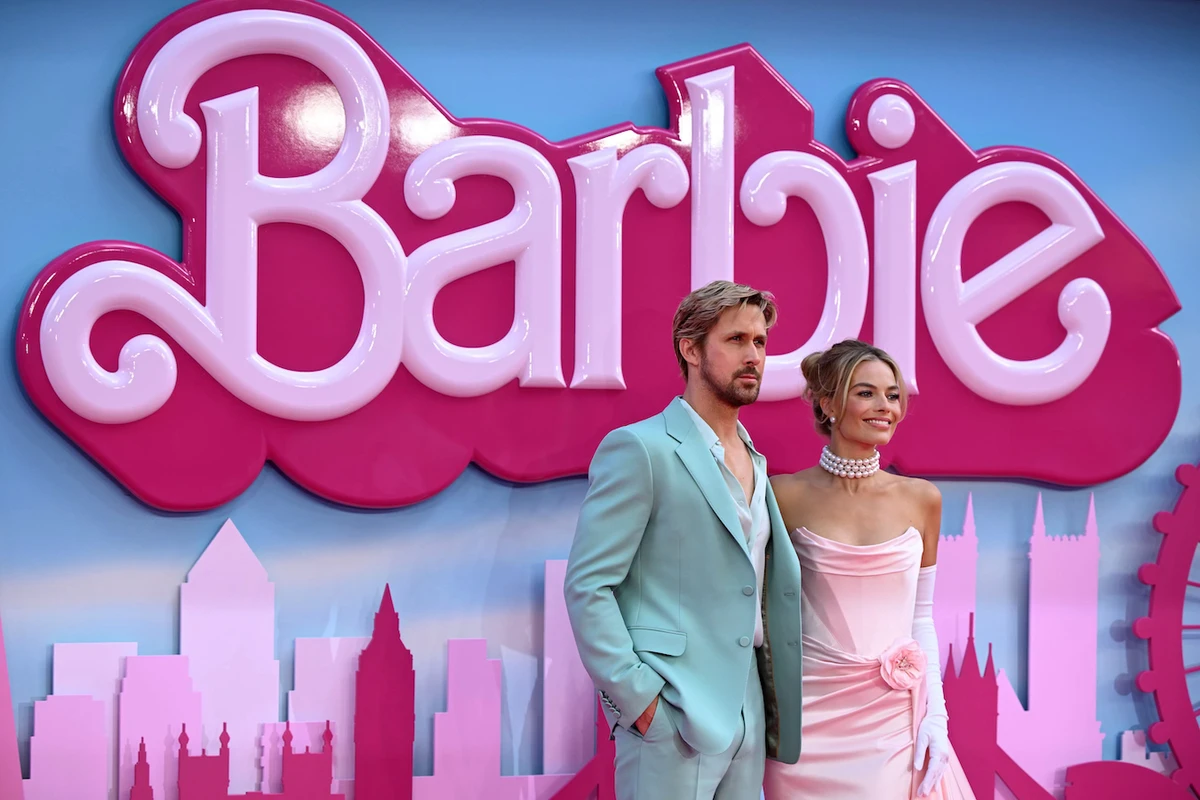 Margot Robbie (R) stars as Barbie and Ryan Gosling (L) plays Ken. (AFP)