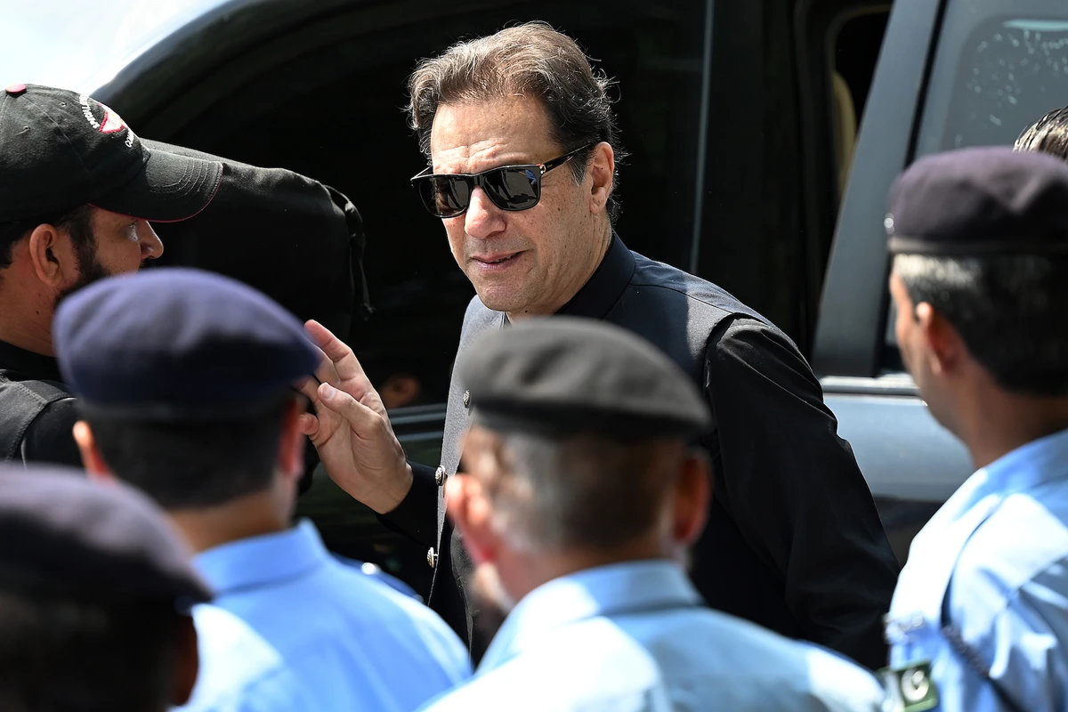 Pakistan’s former Prime Minister Imran Khan (C) arrives to appear in the Supreme Court in Islamabad on July 24, 2023. (AFP)