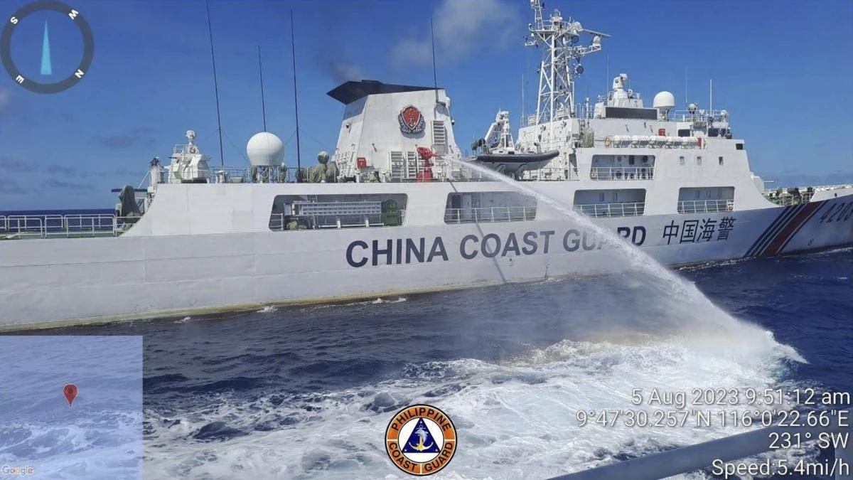 The Philippine military condemned the Chinese coast guard ship’s ‘excessive and offensive’ use of a water cannon to block a Filipino supply boat to the Philippine-occupied Second Thomas Shoal in the disputed South China Sea. (Philippine Coast Guard via AP)