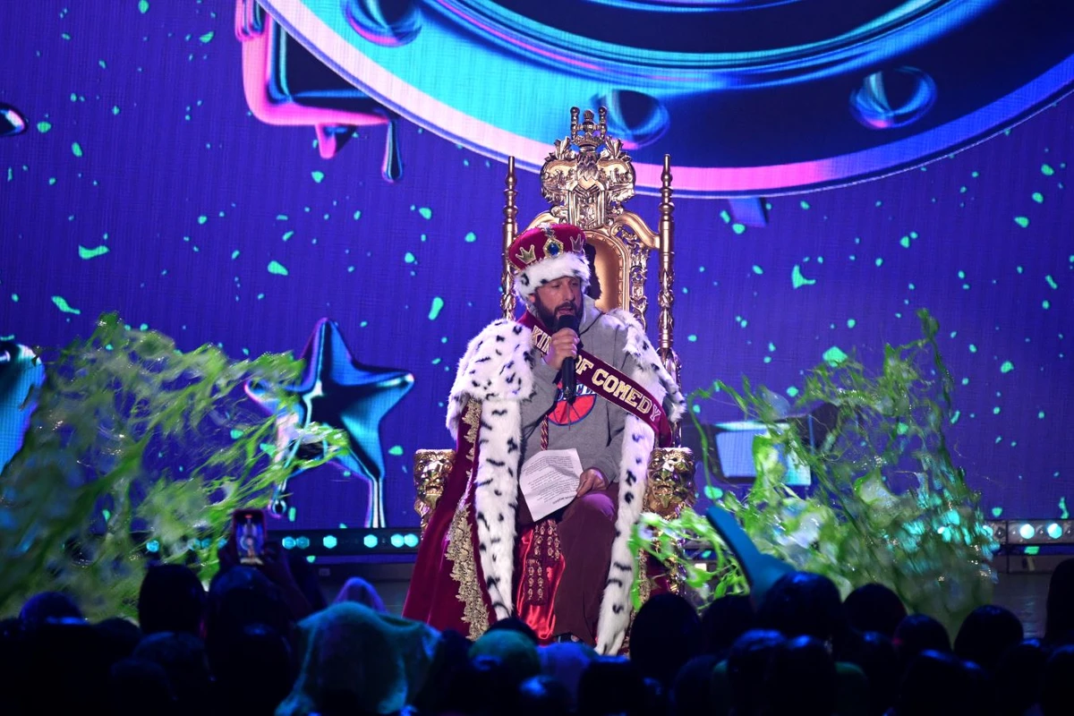 US actor Adam Sandler gets slimed after receiving the King of Comedy Award during the 36th Annual Nickelodeon Kids' Choice Awards at the Microsoft Theater in Los Angeles, California, on March 4, 2023. (AFP)