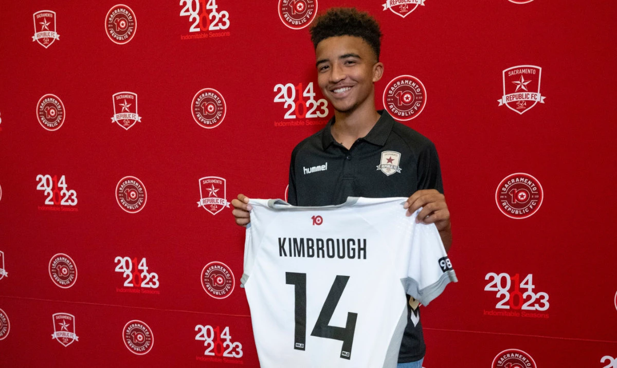 Da'vian Kimbrough, 13, holds up his jersey after signing a contract with the Sacramento Republic of the second-tier League Championship of the United Soccer League, Tuesday in Sacramento, Calif. (AP)