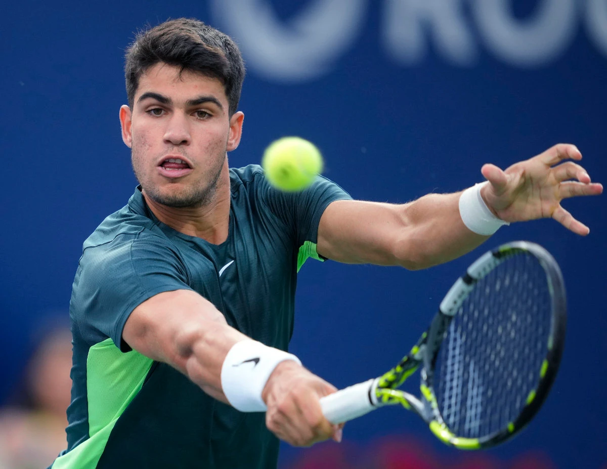 Spain's Carlos Alcaraz returns a shot to US' Ben Shelton during the National Bank Open men’s tennis tournament Wednesday in Toronto. (The Canadian Press via AP)