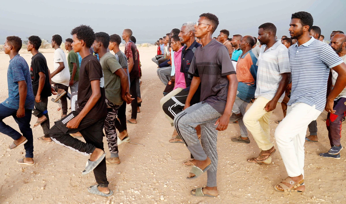 Civilians recruited by the Sudanese Army take part in military training in the Kassinger area of Sudan’s Northern State. (AFP)