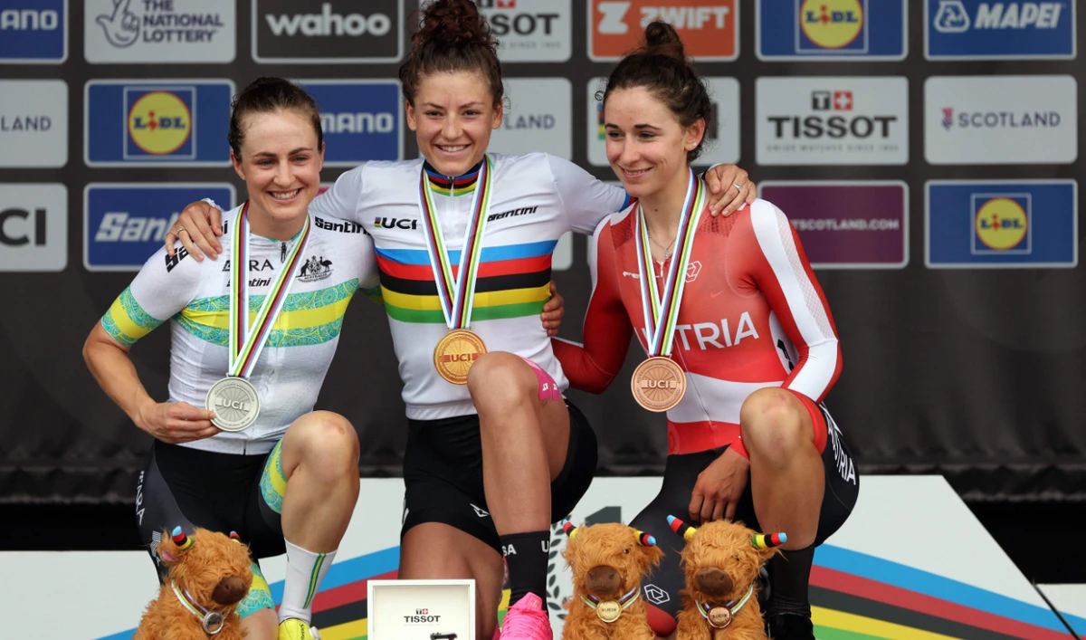 US rider Chloe Dygert (C) celebrates with her gold medal after winning the women's individual time trial during the UCI Cycling World Championships in Scotland on Thursday. Australia's Grace Brown (L) won silver and Austria's Christina Schweinberger won bronze. (AFP)