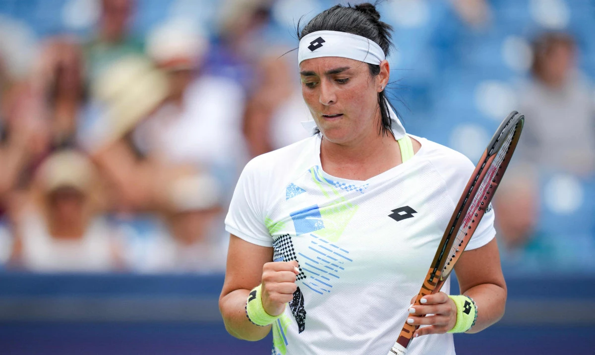 Ons Jabeur of Tunisian reacts after winning a point against Anhelina Kalinina of the Ukraine during their third round match at the Western & Southern Open at Lindner Family Tennis Center on Tuesday. (AFP)