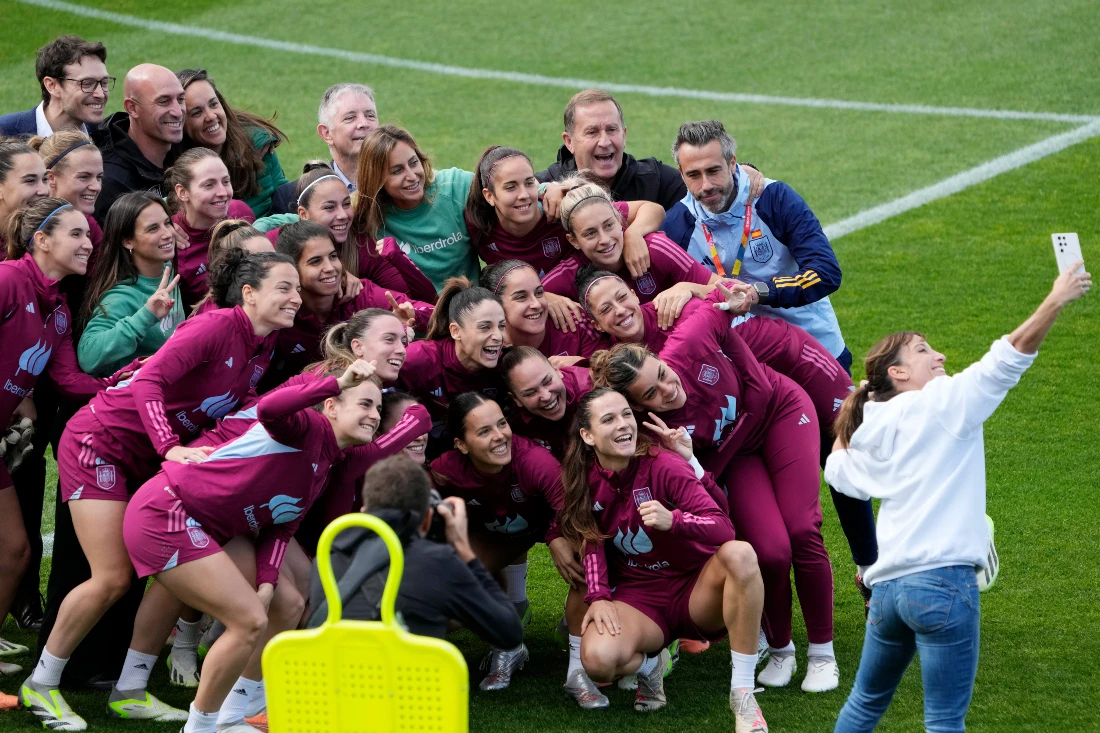 Spain players pose for a photo during a team training session in Sydney ahead of the Women's World Cup final against England. (AP)