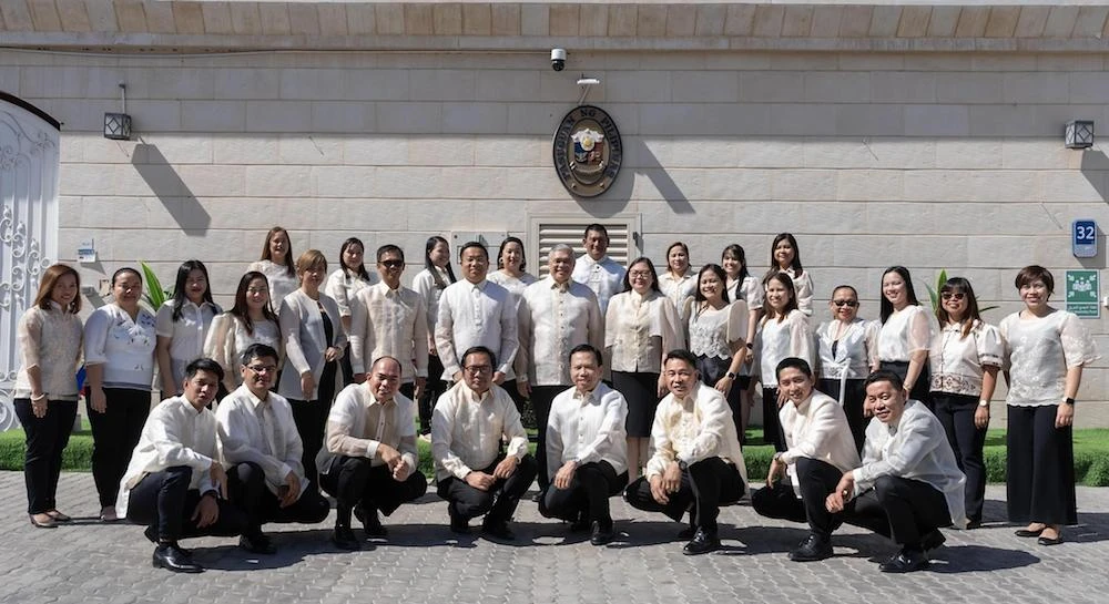 In this undated photo, Philippine Ambassador to the UAE Alfonoso A. Ver, center, second row, poses with Philippine embassy staff in Abu Dhabi. (Philippine Embassy)
